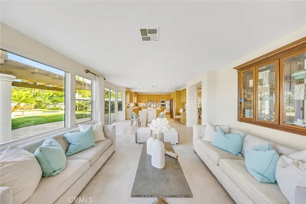 a view of a dining room with furniture window and outside view