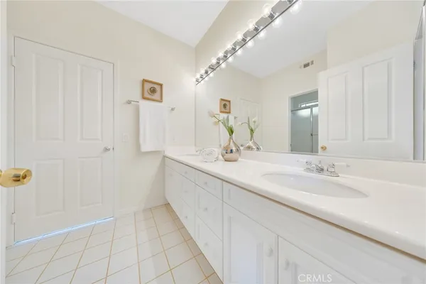 a white bath tub sitting next to a window