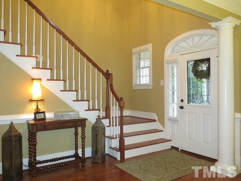 8733 Oregon Inlet Court Raleigh, NC 27603 - Photo 2 of 19 a view of entryway and hall with wooden floor