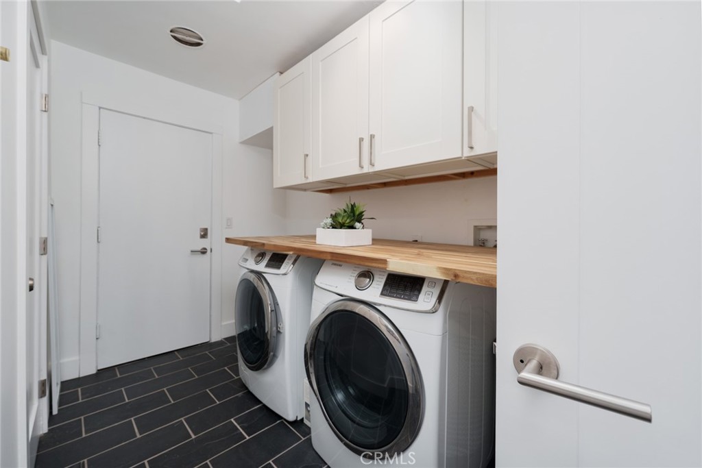 10631 Equestrian Drive North Tustin, CA 92705 - Photo 22 of 35 a utility room with dryer and washer
