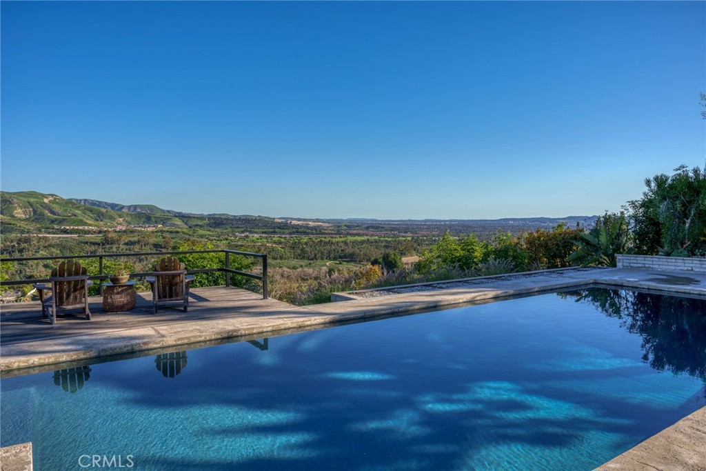 10631 Equestrian Drive North Tustin, CA 92705 - Photo 30 of 35 a view of swimming pool with outdoor seating and city view