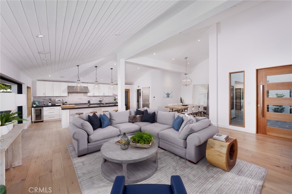 10631 Equestrian Drive North Tustin, CA 92705 - Photo 4 of 35 a living room with furniture and kitchen view