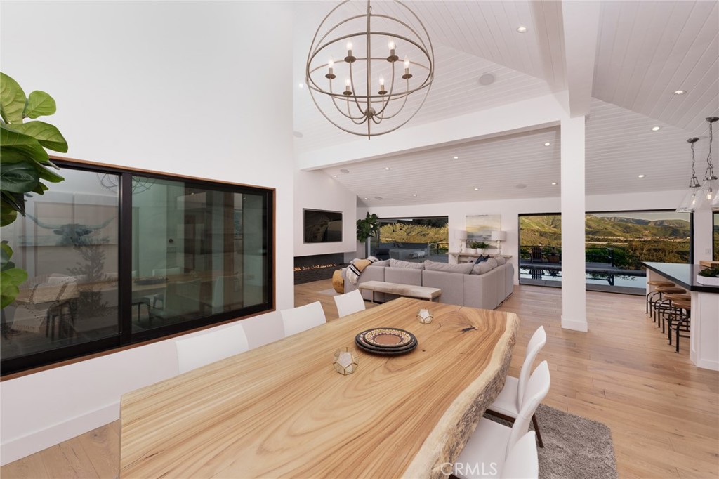 10631 Equestrian Drive North Tustin, CA 92705 - Photo 6 of 35 a view of a dining hall with a table and chairs