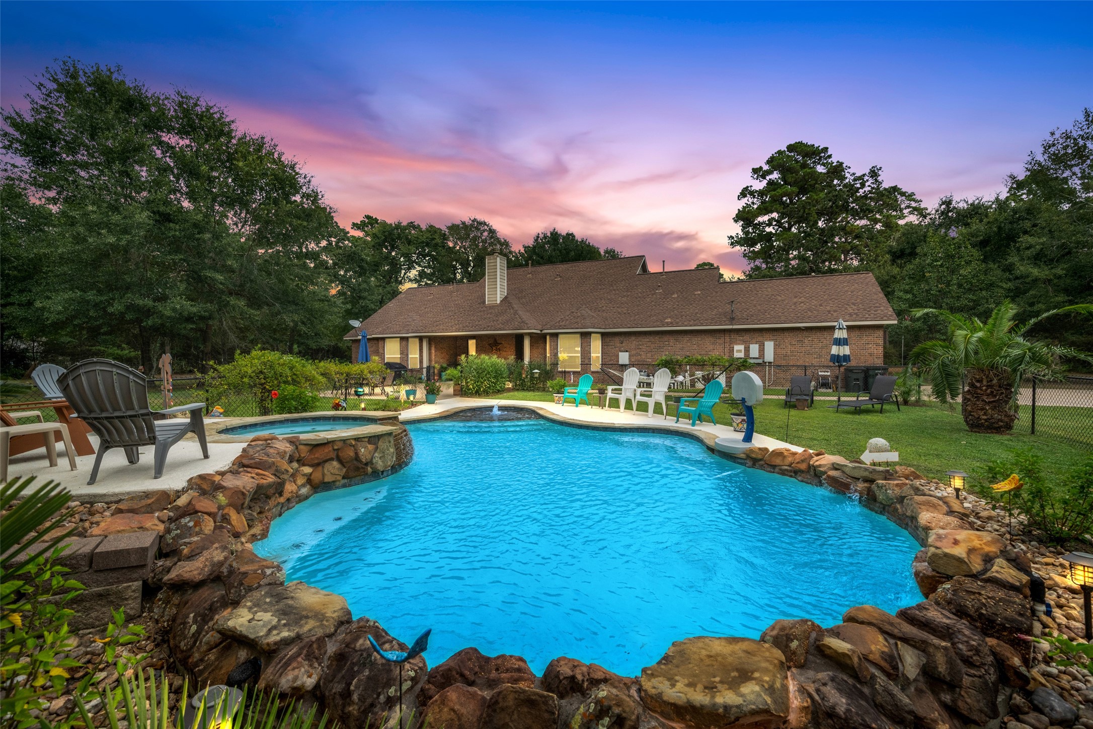 a view of a swimming pool with a patio