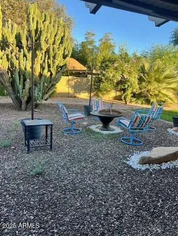 a view of a yard with an outdoor space