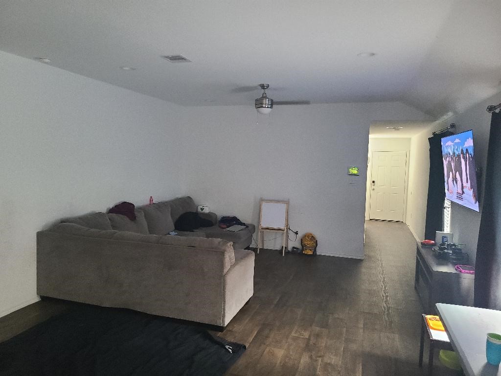 2331 Sandcherry Ln Spring Spring, TX 77373 - Photo 2 of 10 a living room with furniture and a flat screen tv