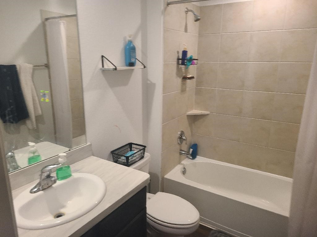 2331 Sandcherry Ln Spring Spring, TX 77373 - Photo 6 of 10 a bathroom with a sink toilet and shower