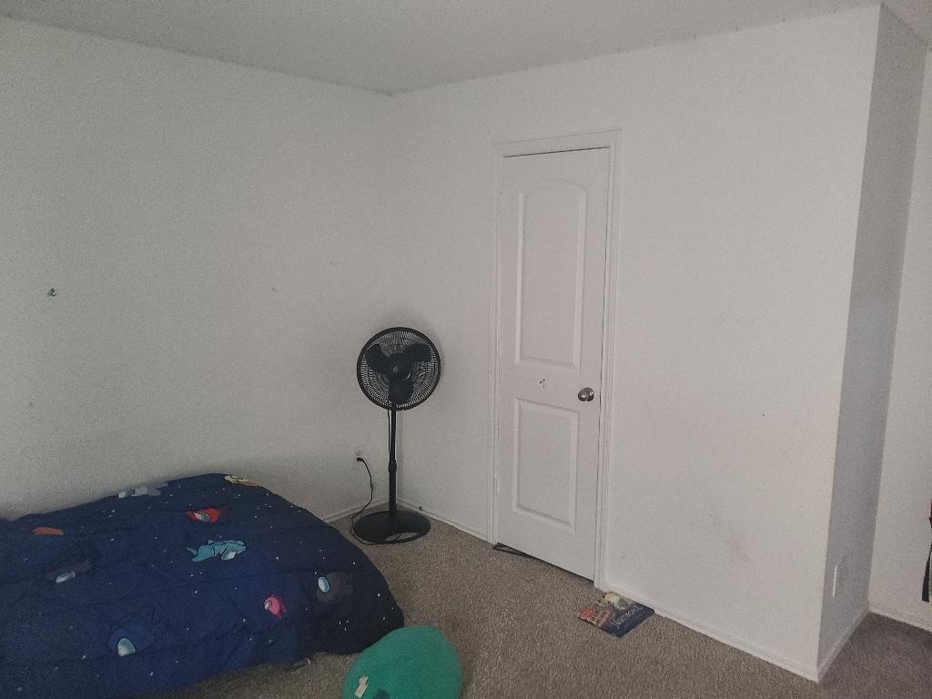 2331 Sandcherry Ln Spring Spring, TX 77373 - Photo 8 of 10 a kitchen with a sink and a chandelier fan