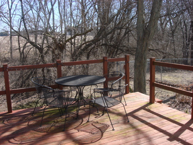 378 Van Orin Road Sublette, IL 61367 - Photo 15 of 25 a backyard of a house with barbeque oven and outdoor seating