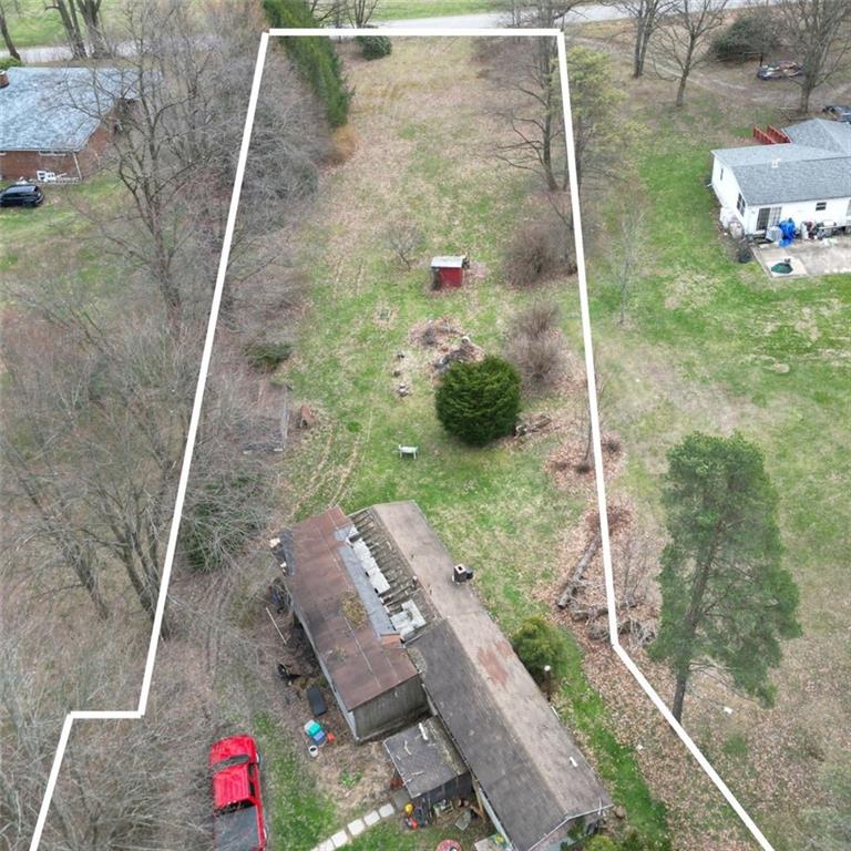 523 Unionville Road Butler, PA 16001 - Photo 12 of 15 a small pool with some trees in the background