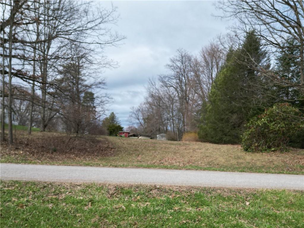 523 Unionville Road Butler, PA 16001 - Photo 13 of 15 a view of a yard with large trees
