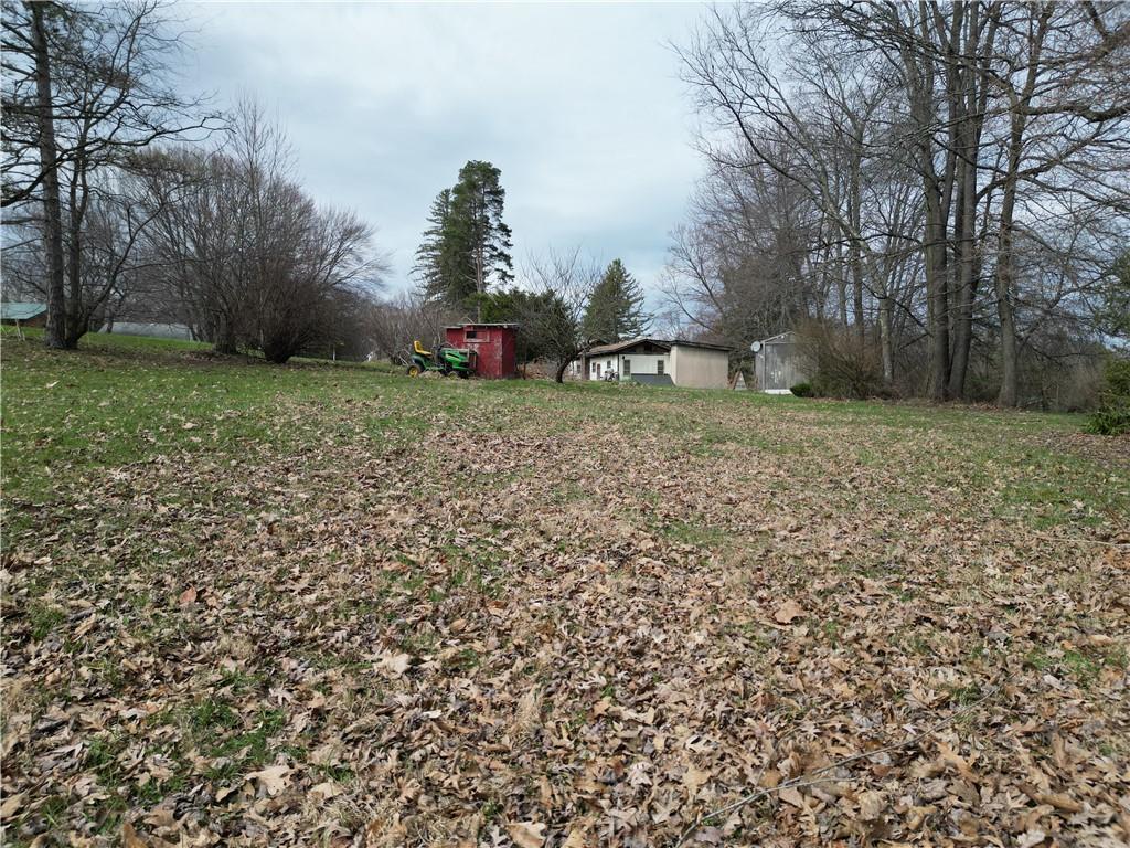 523 Unionville Road Butler, PA 16001 - Photo 14 of 15 a backyard of a house with lots of green space