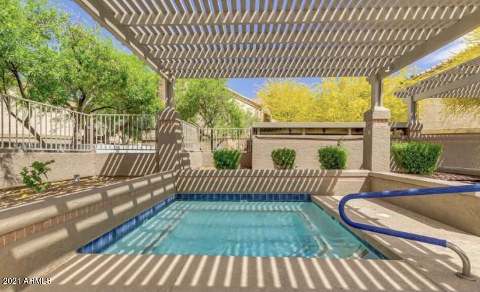 1287 North Alma School Road, Unit 280 Chandler, AZ 85224 - Photo 17 of 22 a view of balcony with wooden floor