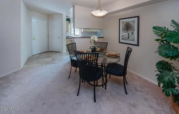 a view of a dining room with furniture