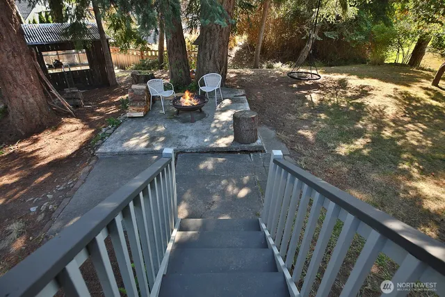 a view of a porch with two chairs