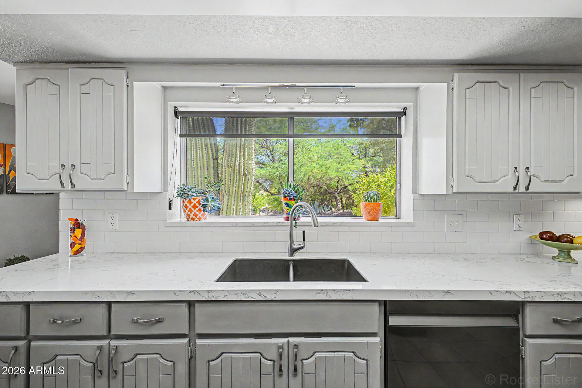 18409 East Horseshoe Bend Rio Verde, AZ 85263 - Photo 17 of 33 a kitchen with a sink cabinets and window