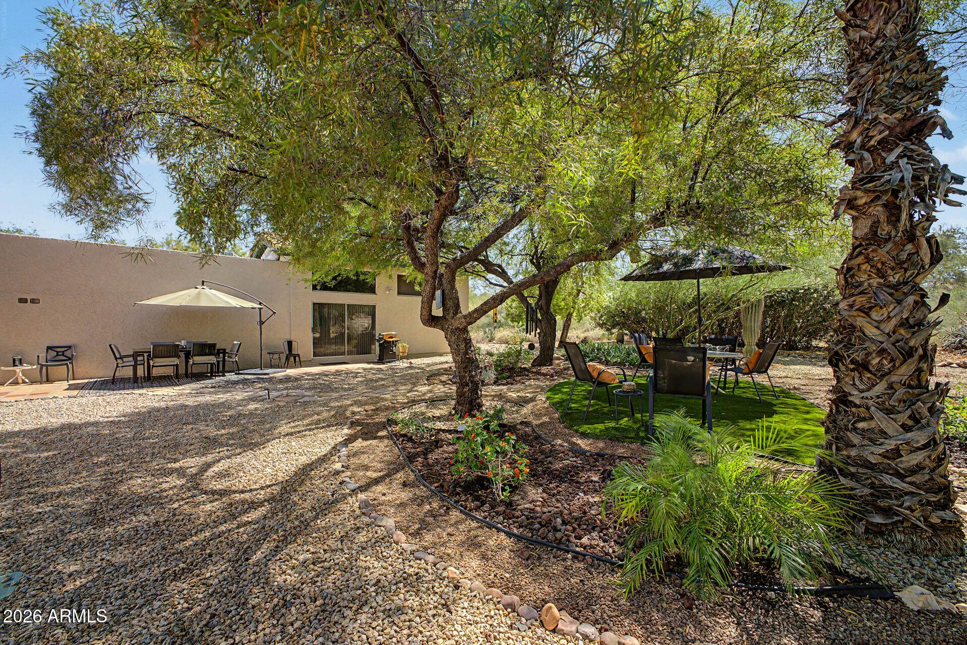 18409 East Horseshoe Bend Rio Verde, AZ 85263 - Photo 29 of 33 a view of a backyard with large trees