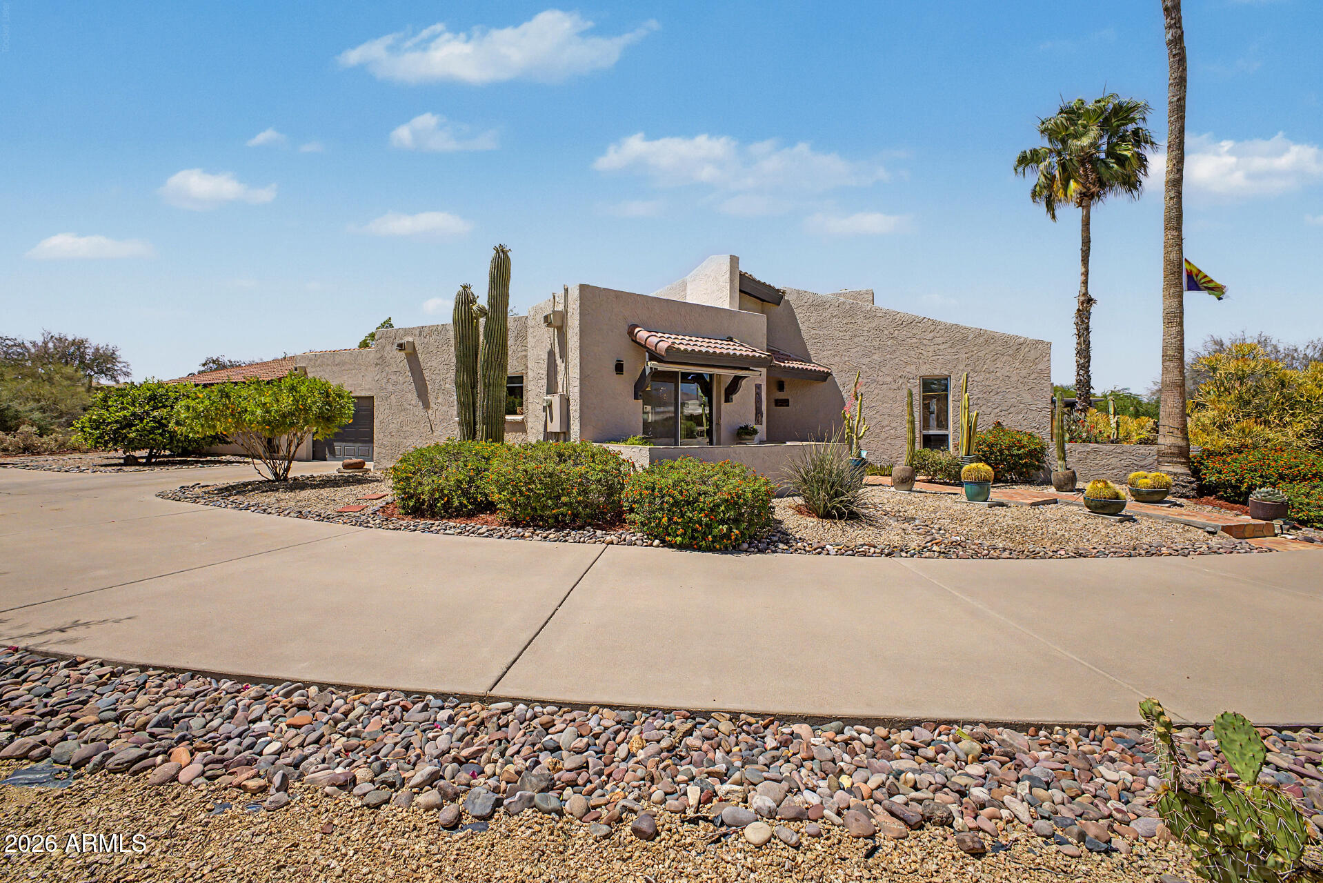 18409 East Horseshoe Bend Rio Verde, AZ 85263 - Photo 3 of 33 a front view of a house with a yard and mountain view