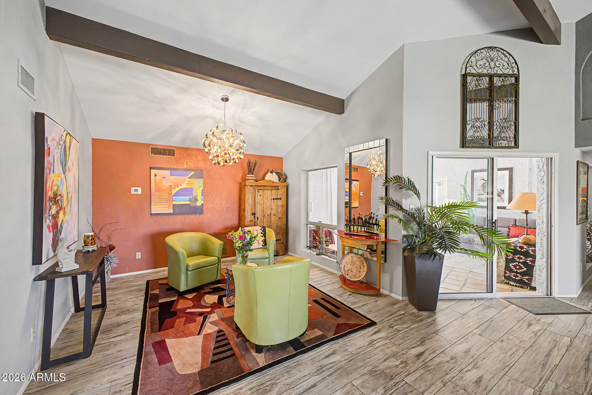 18409 East Horseshoe Bend Rio Verde, AZ 85263 - Photo 7 of 33 a living room with furniture a chandelier and a window