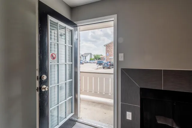 a bathroom with a shower and a sink
