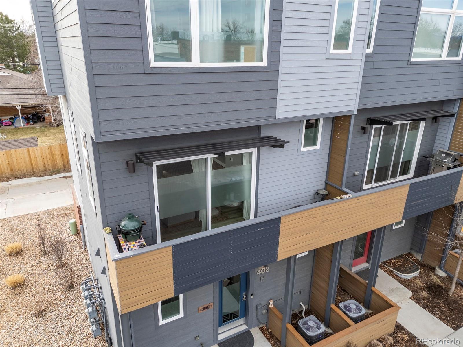 402 West Baseline Road, Unit H Lafayette, CO 80026 - Photo 30 of 37 a view of a house with a window and sitting area