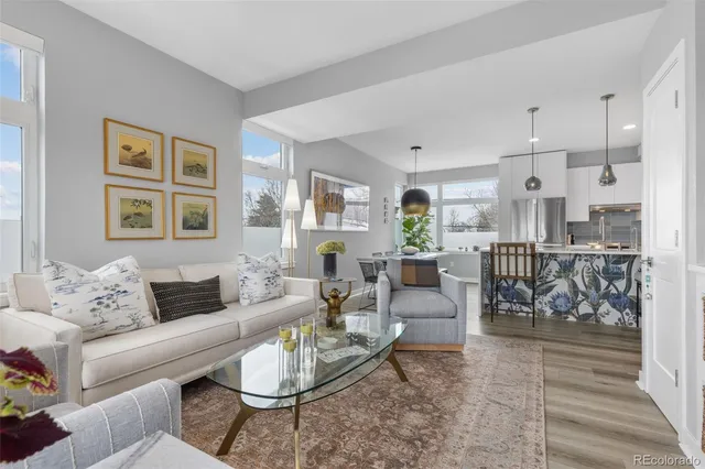 a living room with furniture and a table