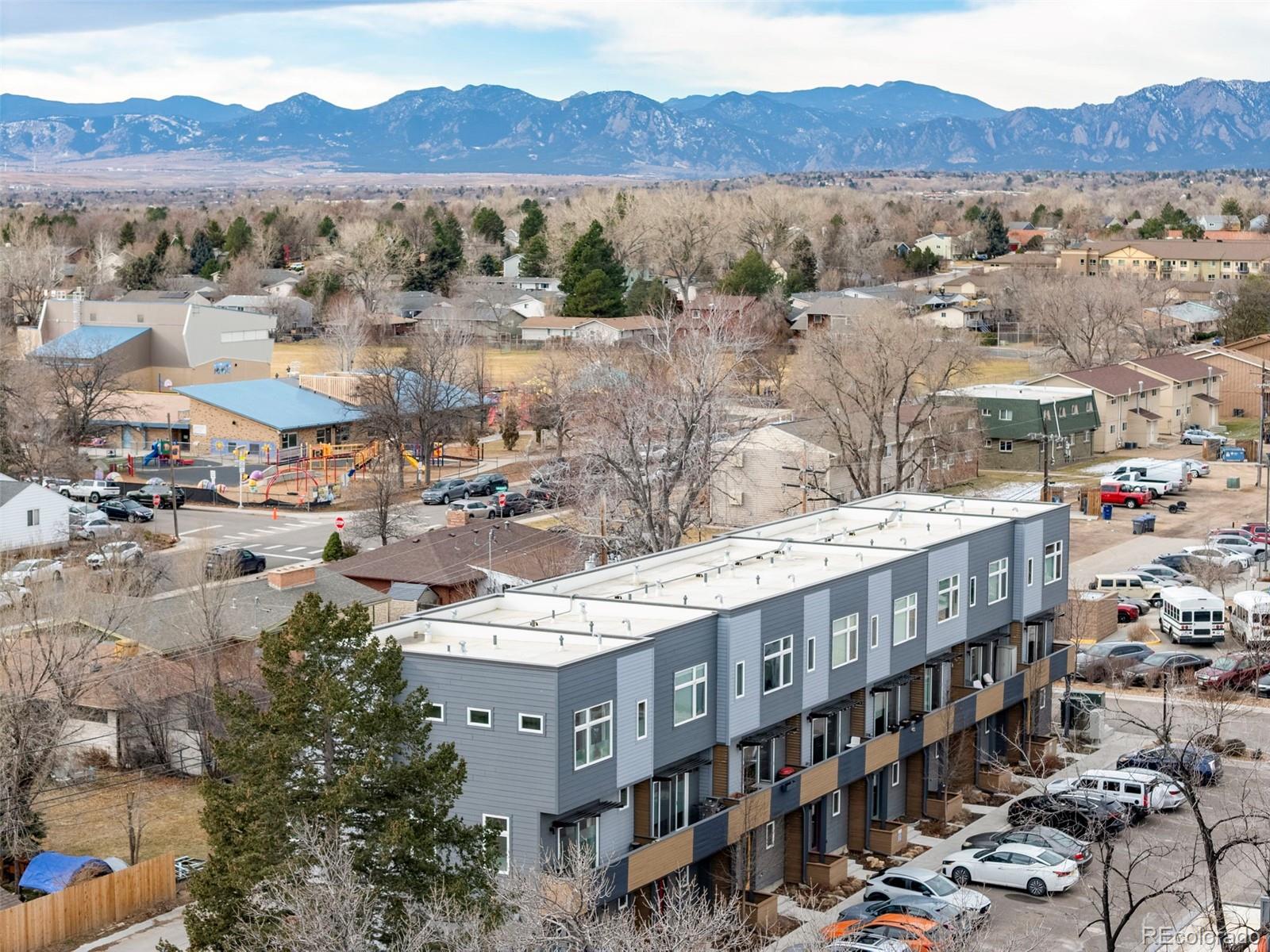 402 West Baseline Road, Unit H Lafayette, CO 80026 - Photo 31 of 37 a view of a city with a mountain