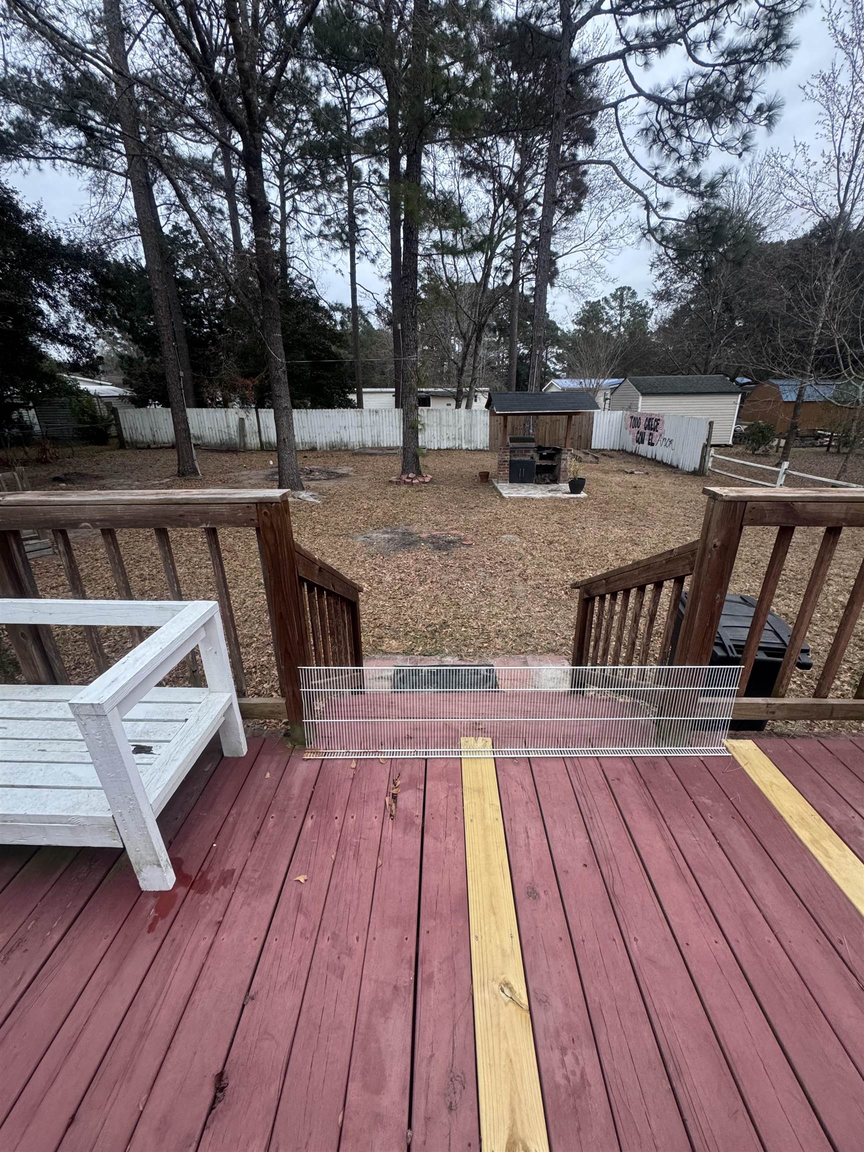 2427 Huntington Circle Conway, SC 29526 - Photo 13 of 19 Wooden terrace with a fenced backyard
