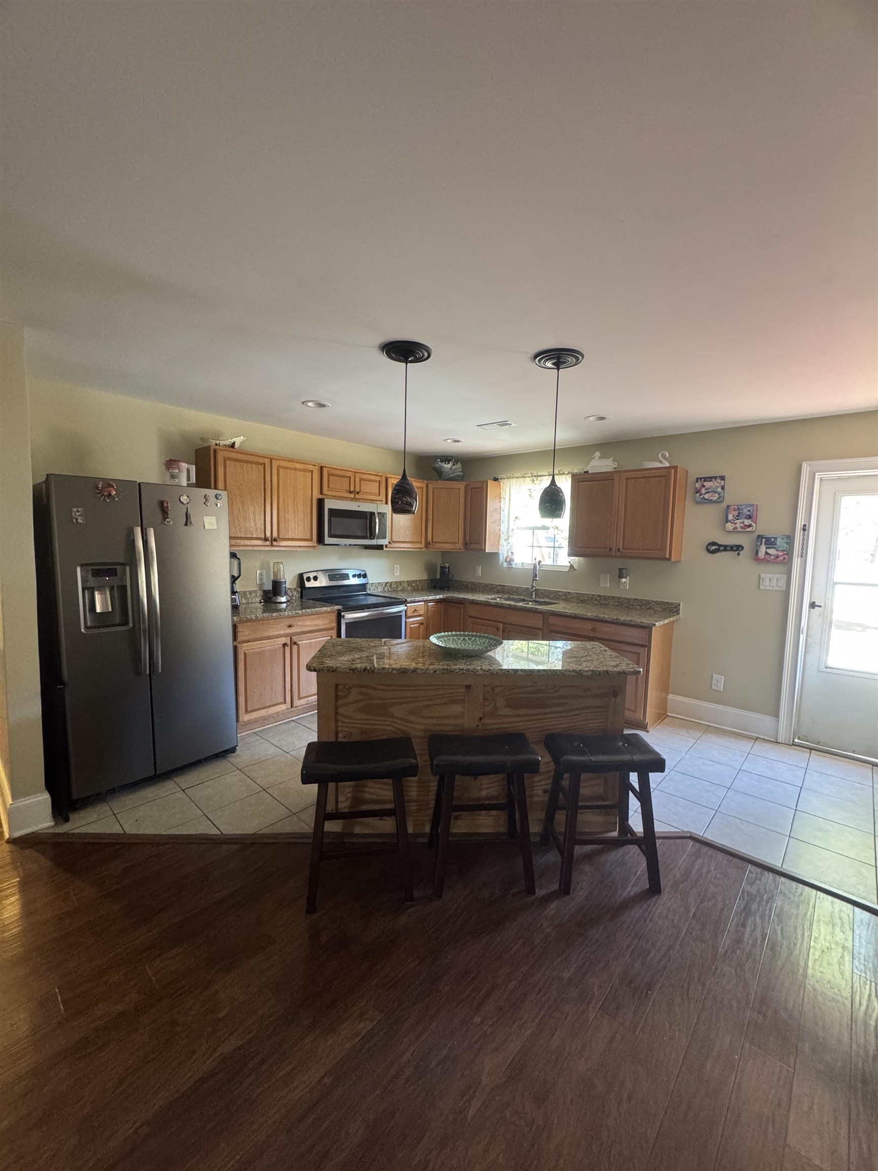 2427 Huntington Circle Conway, SC 29526 - Photo 2 of 19 Dining room featuring baseboards and light wood-style floors