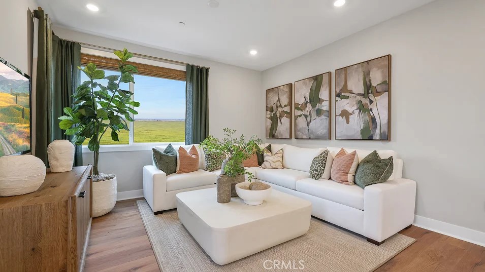 1022 Currant Road Fullerton, CA 92833 - Photo 3 of 25 a living room with furniture and a large window