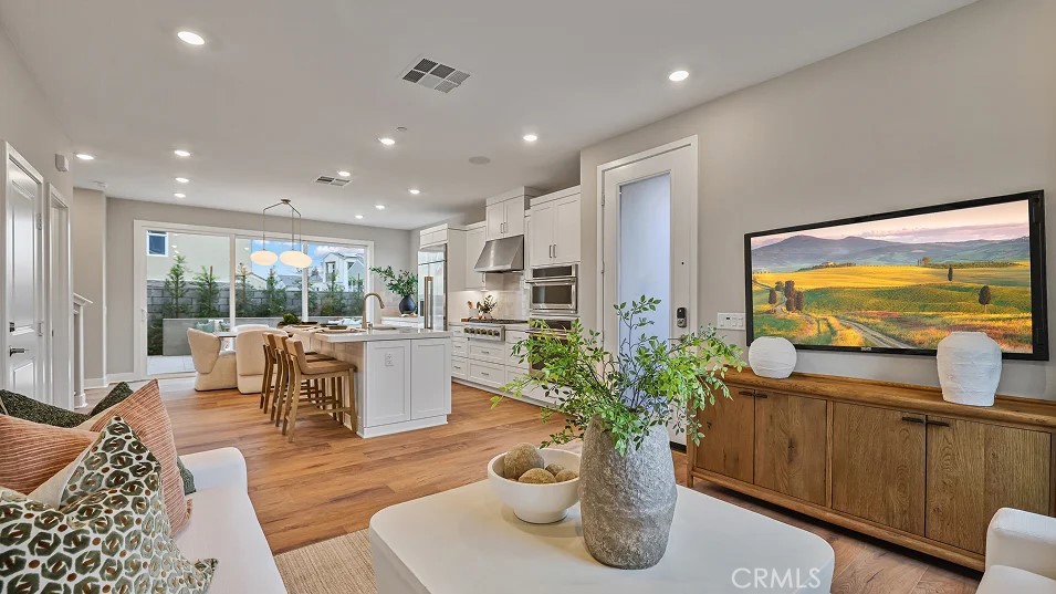 1022 Currant Road Fullerton, CA 92833 - Photo 4 of 25 a living room with furniture and a potted plant