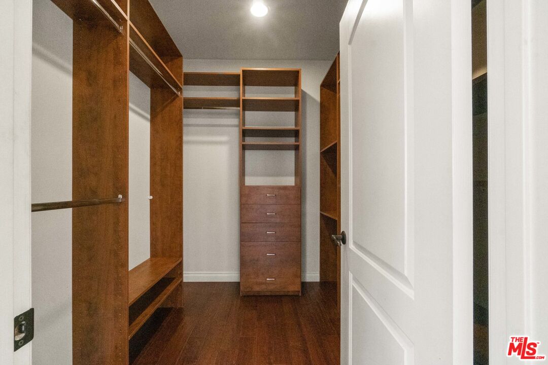 10765 Wilkins Avenue, Unit 8 Los Angeles, CA 90024 - Photo 14 of 33 a view of walk in closet with wooden floor