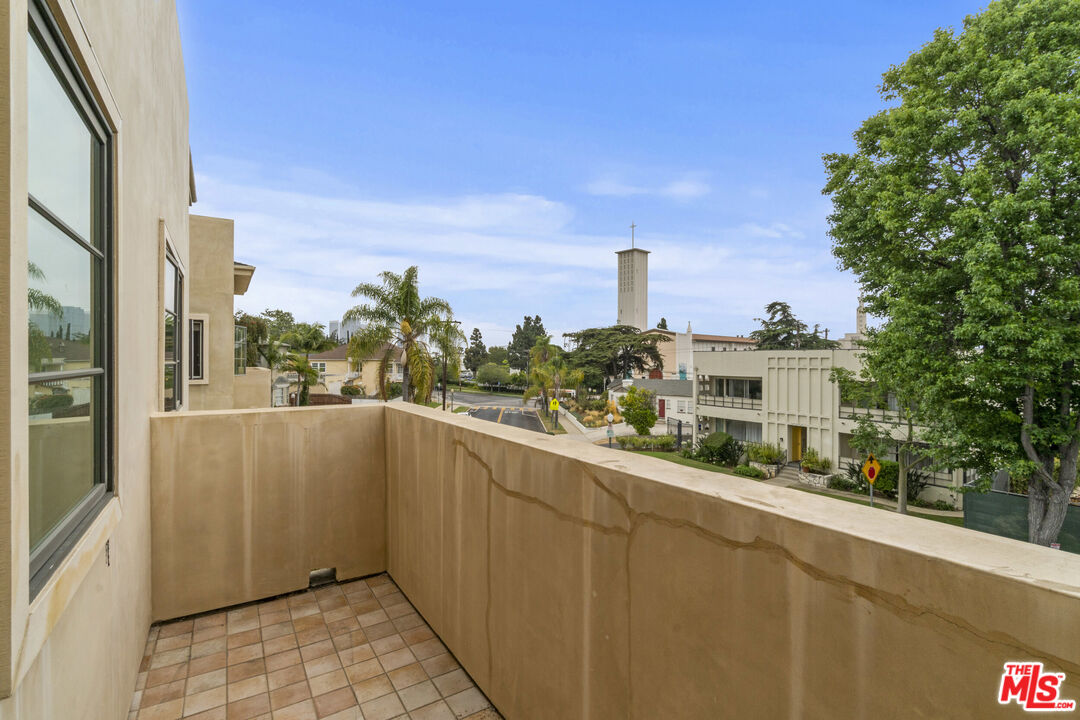 10765 Wilkins Avenue, Unit 8 Los Angeles, CA 90024 - Photo 18 of 33 a view of a balcony with city view