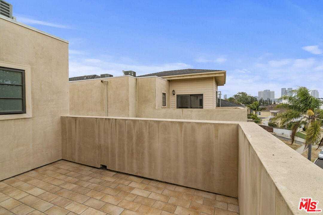 10765 Wilkins Avenue, Unit 8 Los Angeles, CA 90024 - Photo 27 of 33 a view of a balcony with furniture
