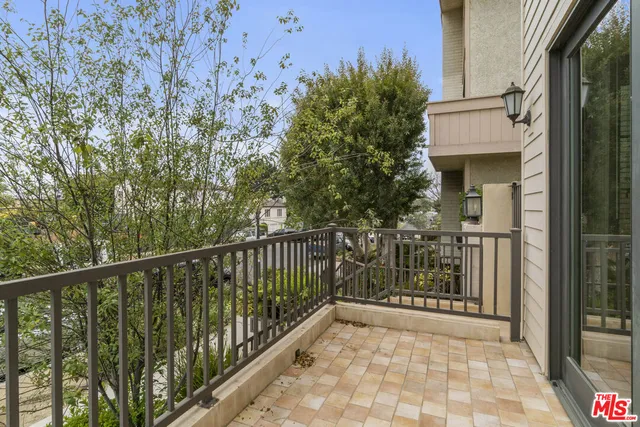 a view of a pathway of a balcony