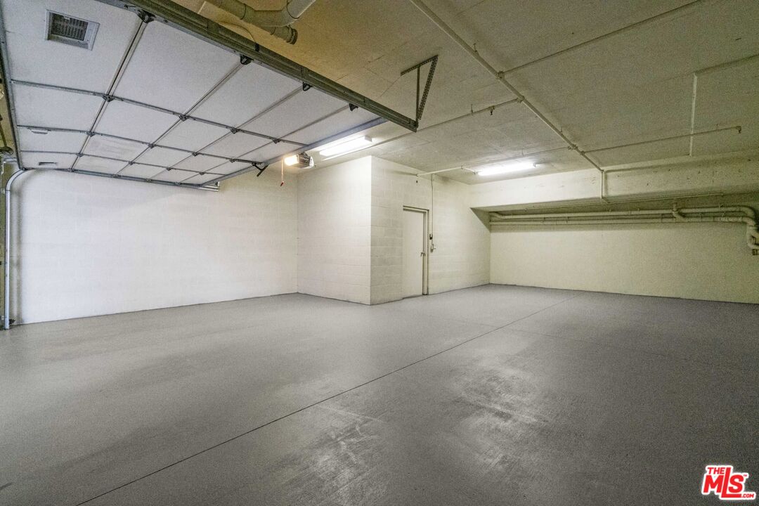 10765 Wilkins Avenue, Unit 8 Los Angeles, CA 90024 - Photo 32 of 33 a view of a garage