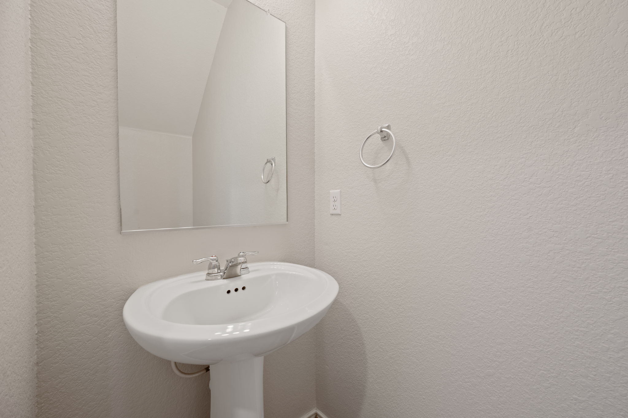 817 Circle Way Jarrell, TX 76537 - Photo 16 of 39 a bathroom with a sink and mirror