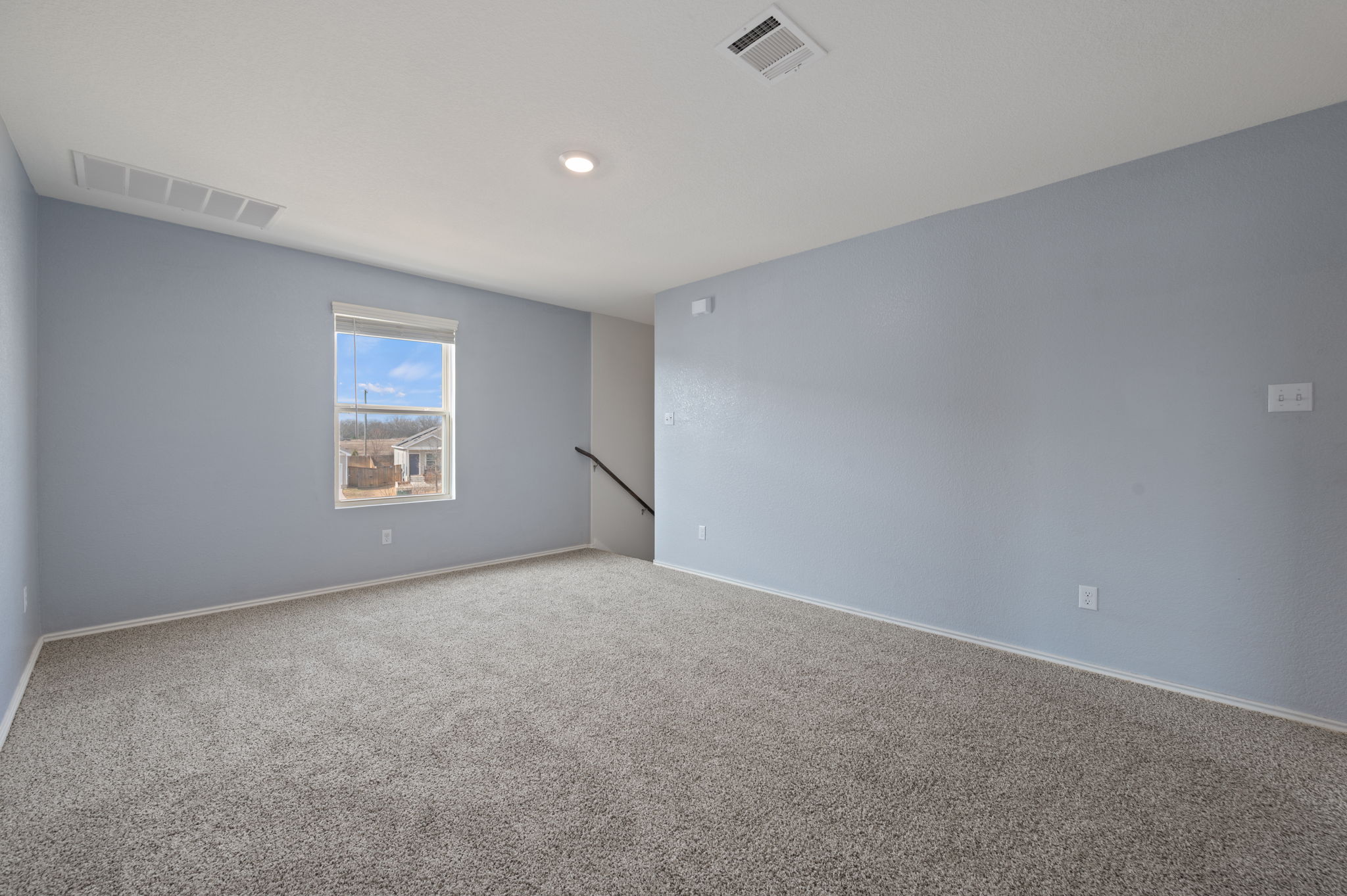 817 Circle Way Jarrell, TX 76537 - Photo 18 of 39 an empty room with windows