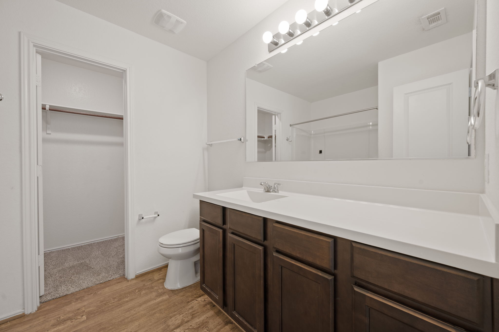 817 Circle Way Jarrell, TX 76537 - Photo 23 of 39 a bathroom with a sink a toilet a shower and a mirror