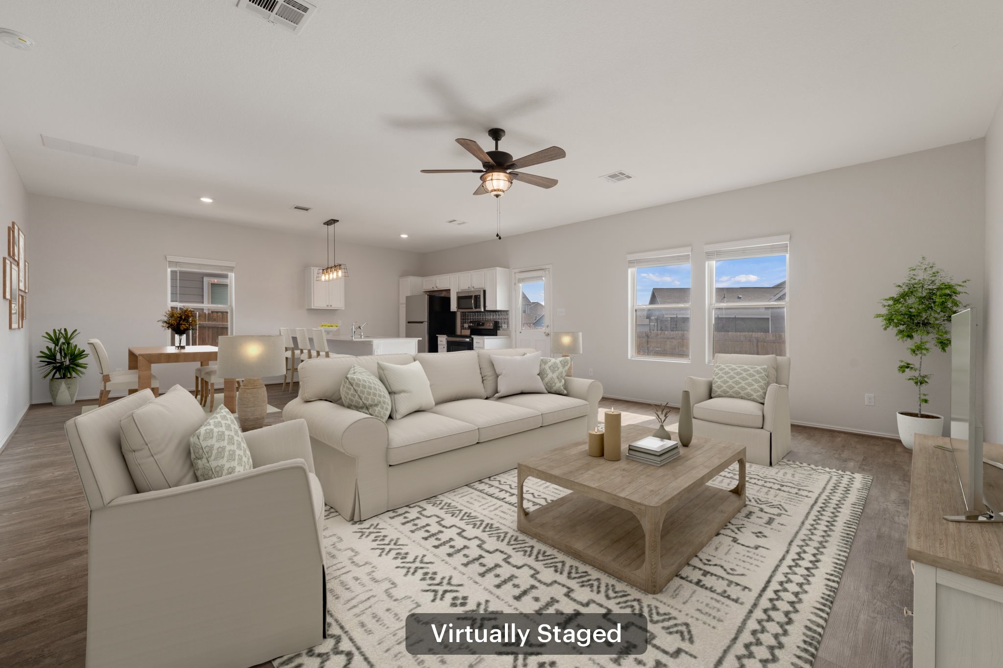 817 Circle Way Jarrell, TX 76537 - Photo 3 of 39 a living room with furniture a chandelier and a window