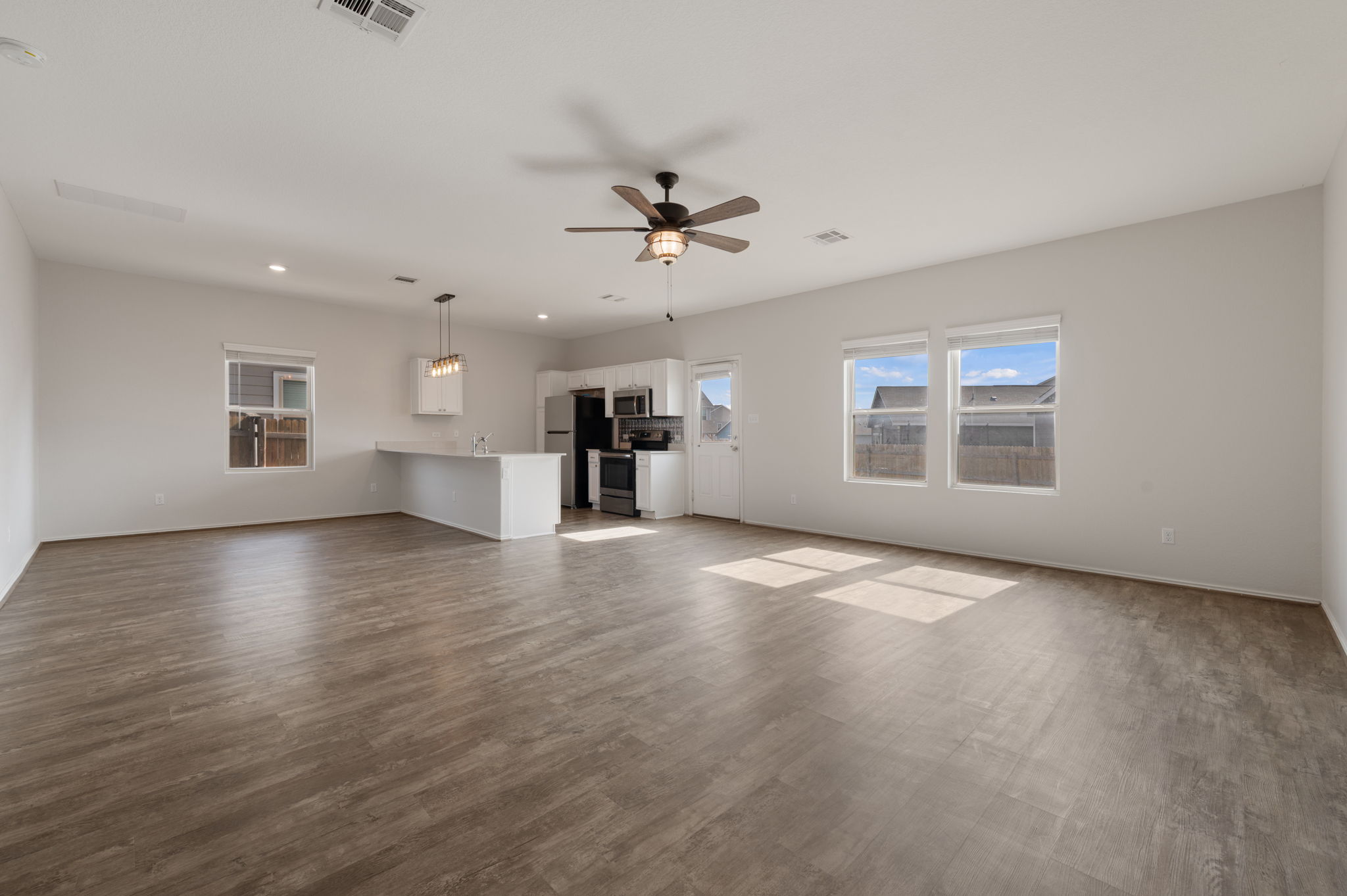 817 Circle Way Jarrell, TX 76537 - Photo 4 of 39 a view of livingroom and hardwood floor