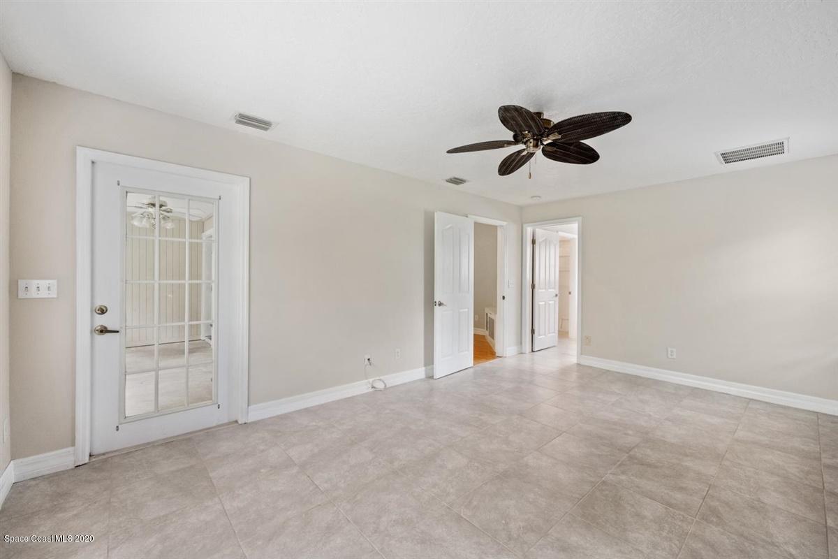 5551 Senne Road Micco, FL 32976 - Photo 11 of 37 wooden floor in an empty room