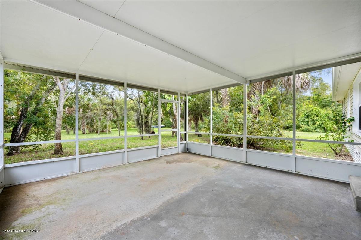 5551 Senne Road Micco, FL 32976 - Photo 23 of 37 a view of a garden with an outdoor seating
