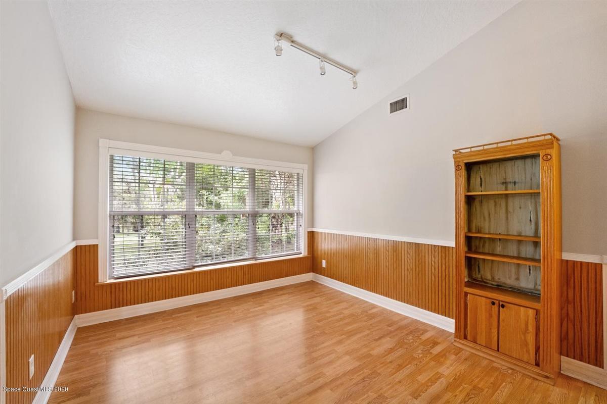 5551 Senne Road Micco, FL 32976 - Photo 10 of 37 a view of empty room with wooden floor and fan
