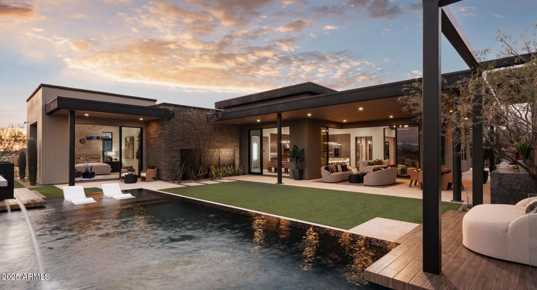 12602 East Chama Road, Unit 603 Scottsdale, AZ 85255 - Photo 2 of 11 a view of a house with backyard and porch