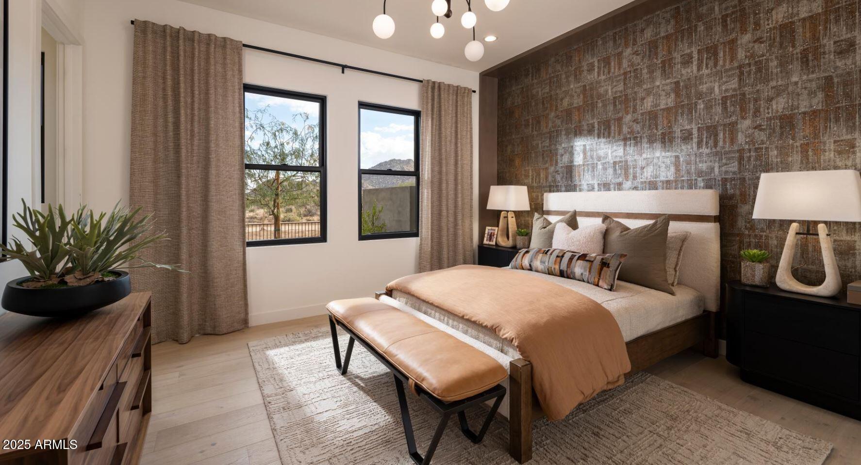 12602 East Chama Road, Unit 603 Scottsdale, AZ 85255 - Photo 9 of 11 a bedroom with a bed and a potted plant