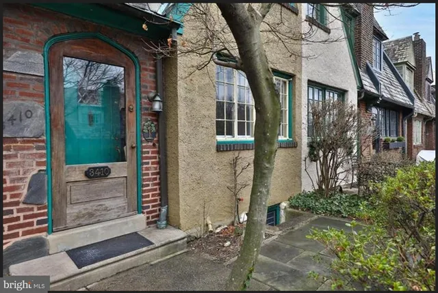 a view of a house with a glass door