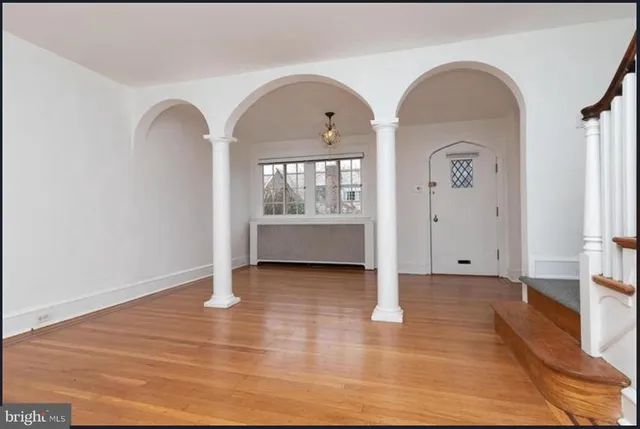 a view of entryway with wooden floor