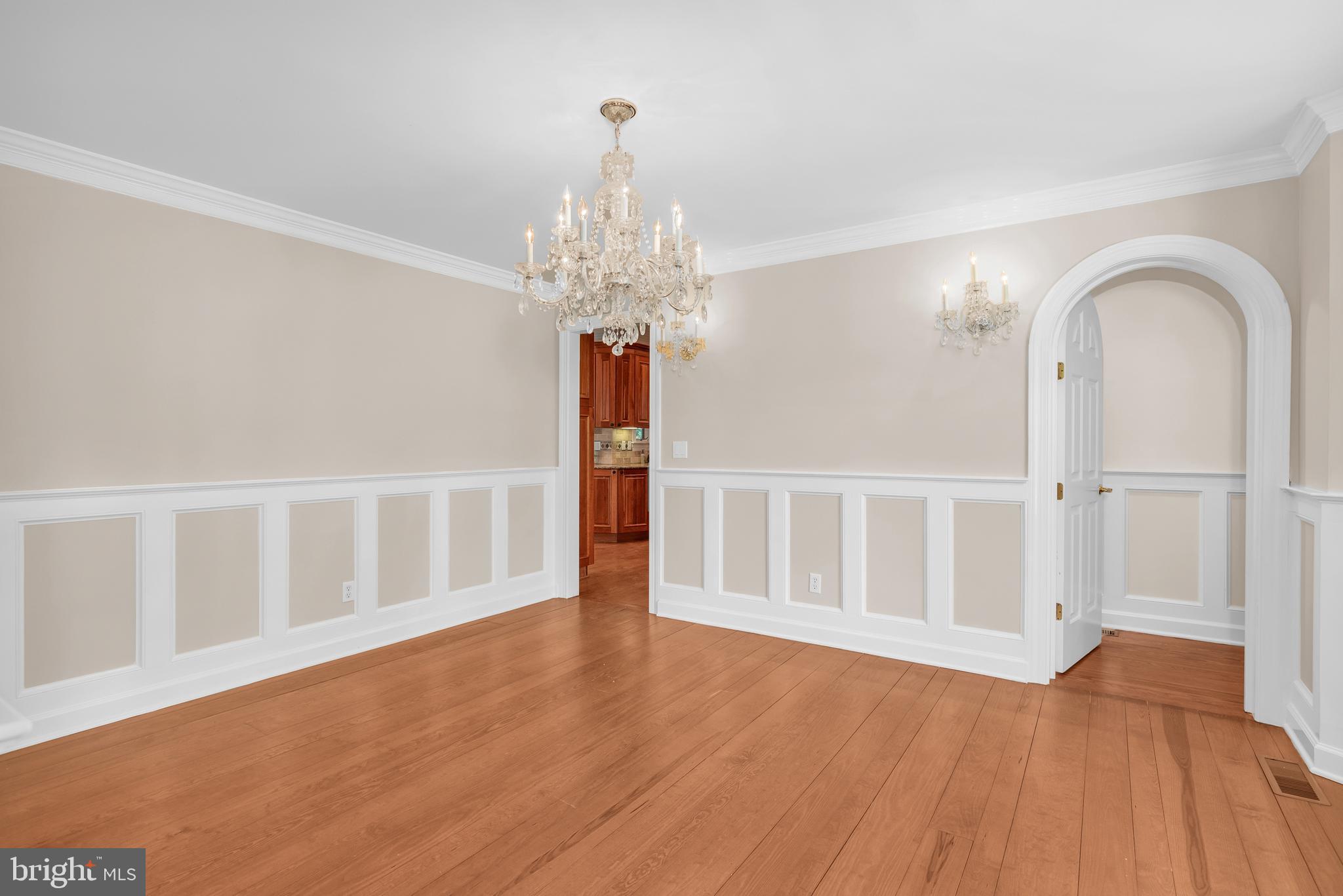 24420 Mallard Place St. Michaels, MD 21663 - Photo 11 of 33 a view of an empty room with wooden floor and a window