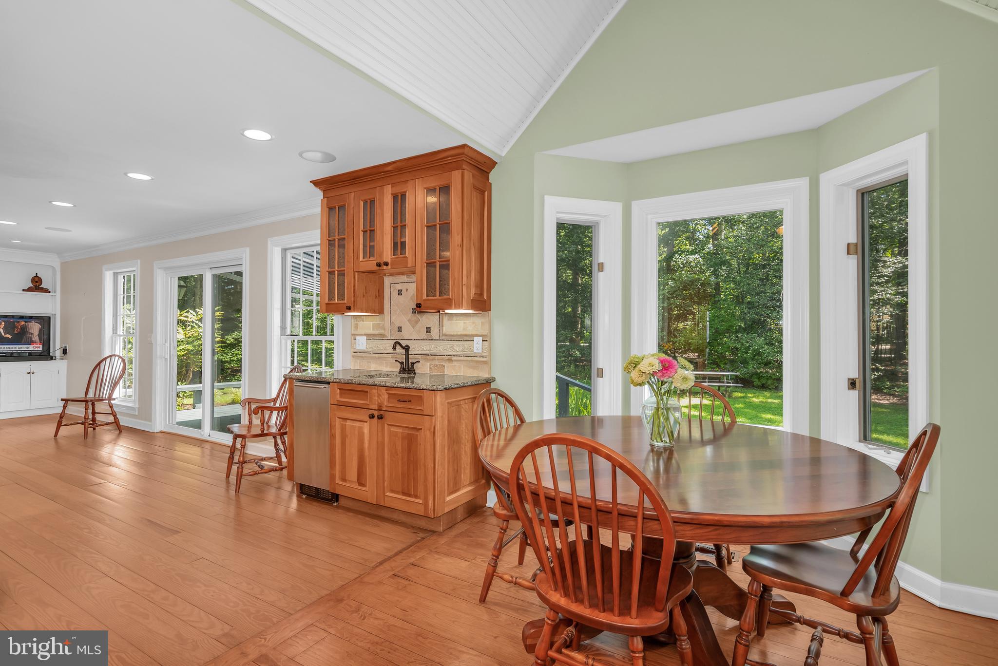24420 Mallard Place St. Michaels, MD 21663 - Photo 15 of 33 a dining room with furniture window wooden floor